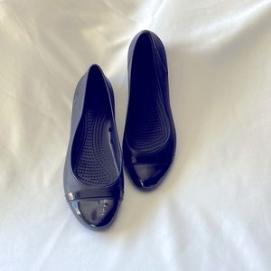 LADIE’S CROCKS; SIZE 10; JET BLACK SLIP-ON LOAFER STYLE. $20